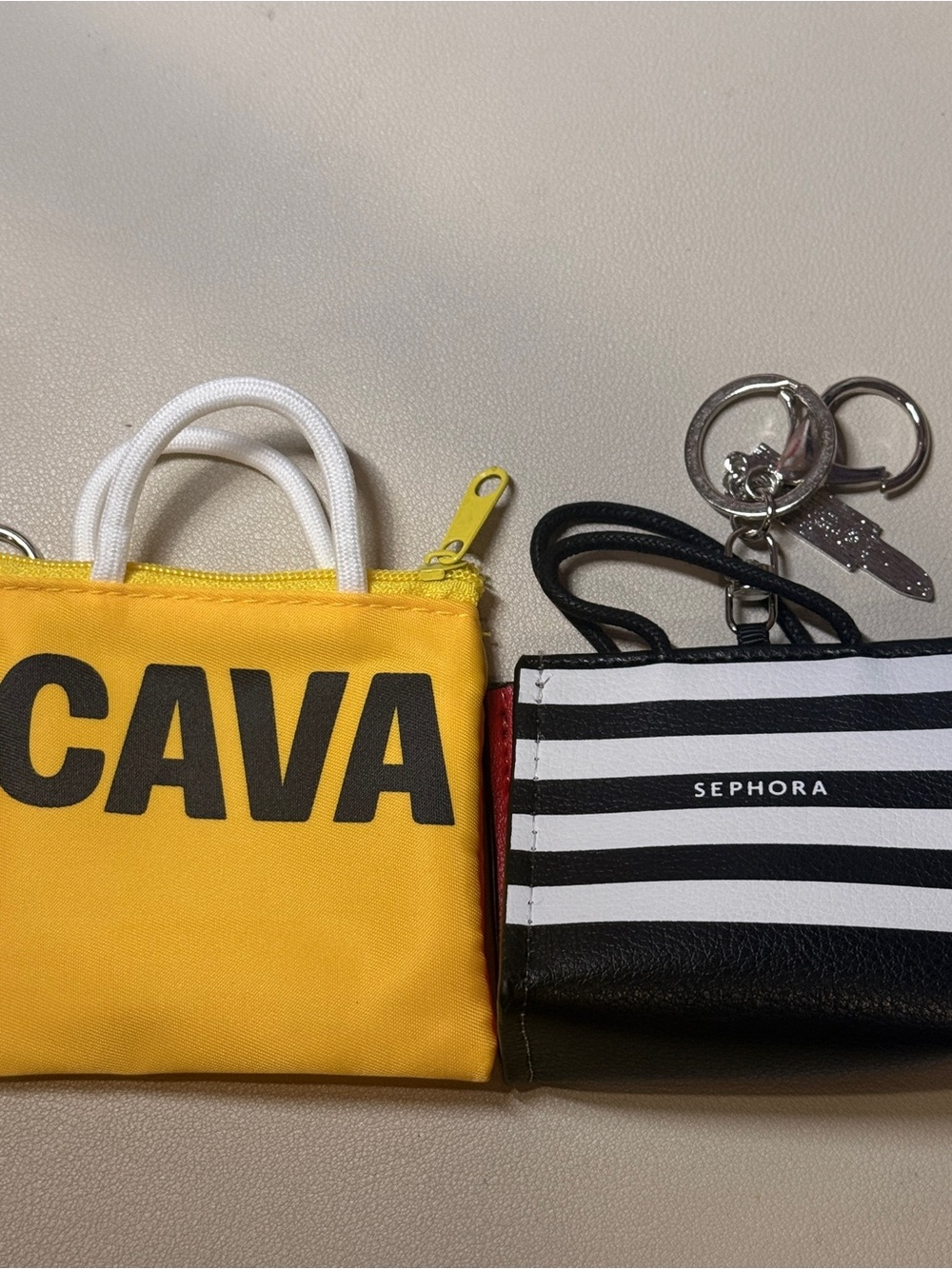 Sephora and Cava bag charms